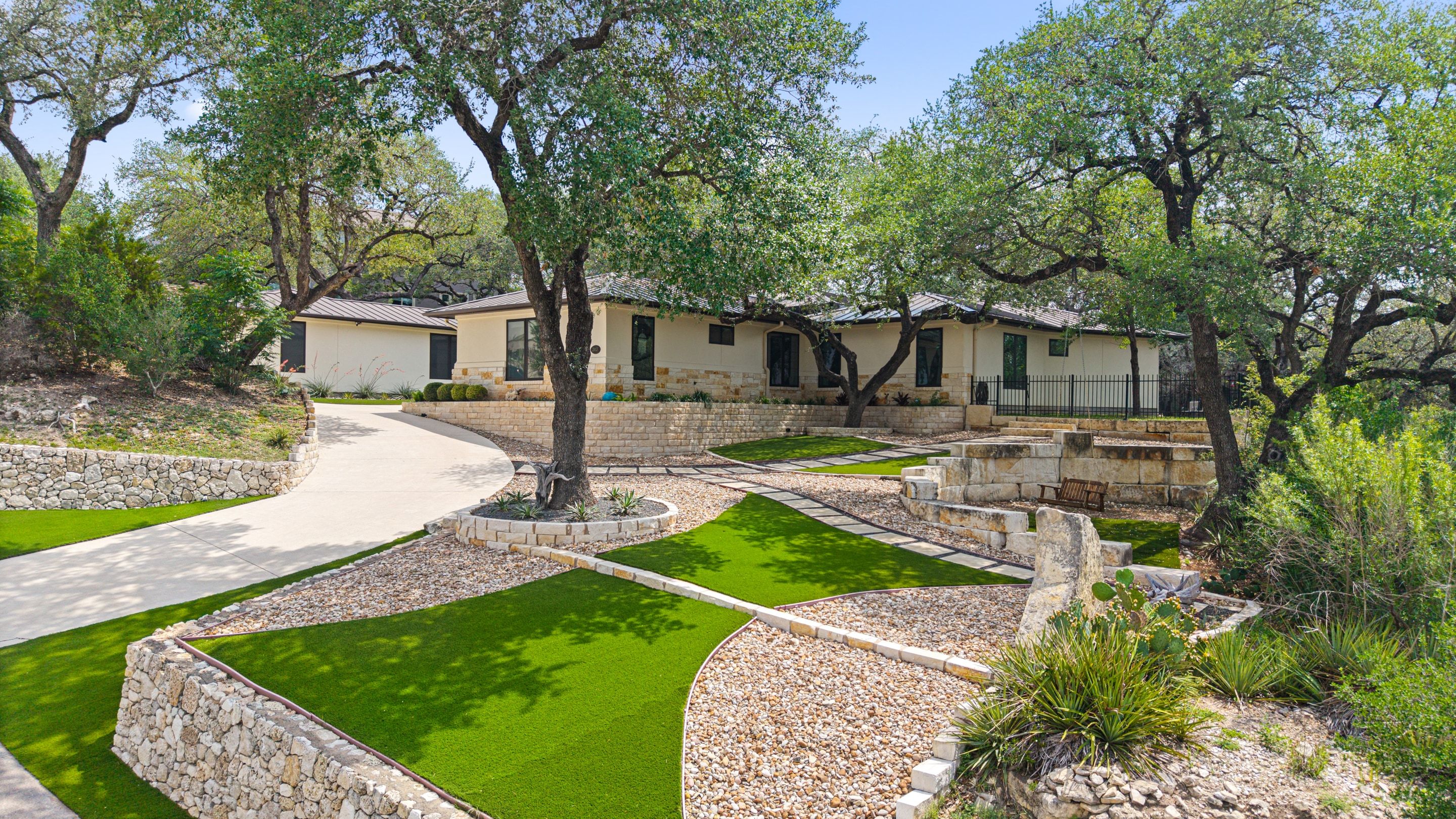 2413 Arion Circle Austin, TX 78730 — Single-Story Custom Home on a Greenbelt Lot in the Gated Woods of Greenshores